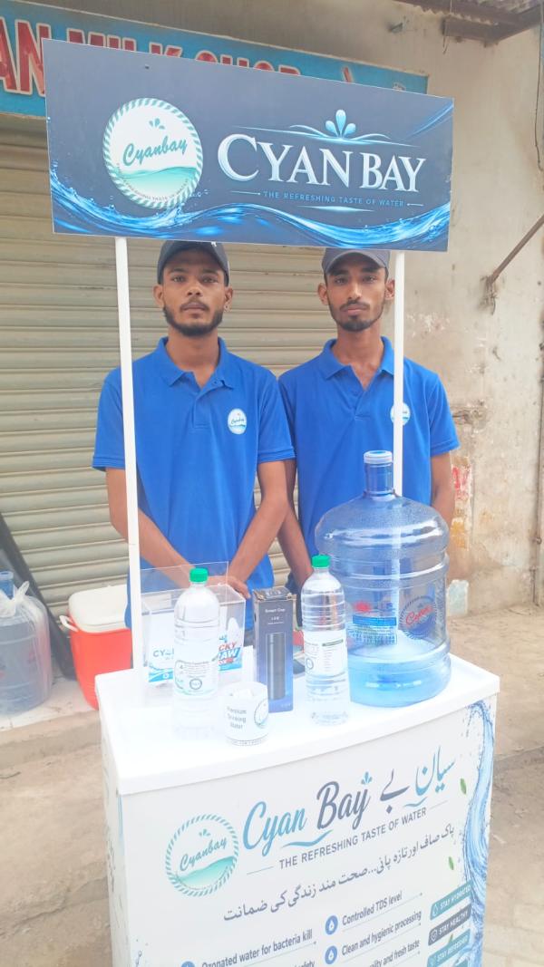 Our stall with 19 L, 1.5 L and 500 ml bottles and lucky draw box